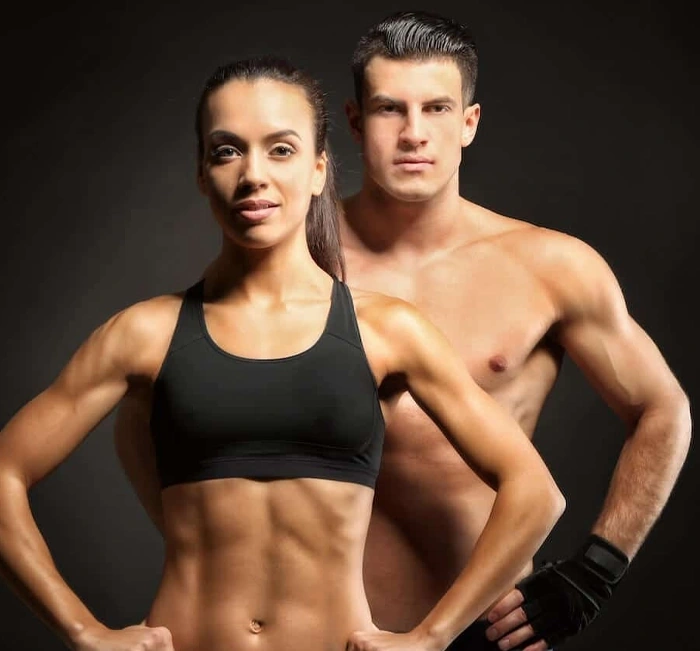 Two people with athletic physiques